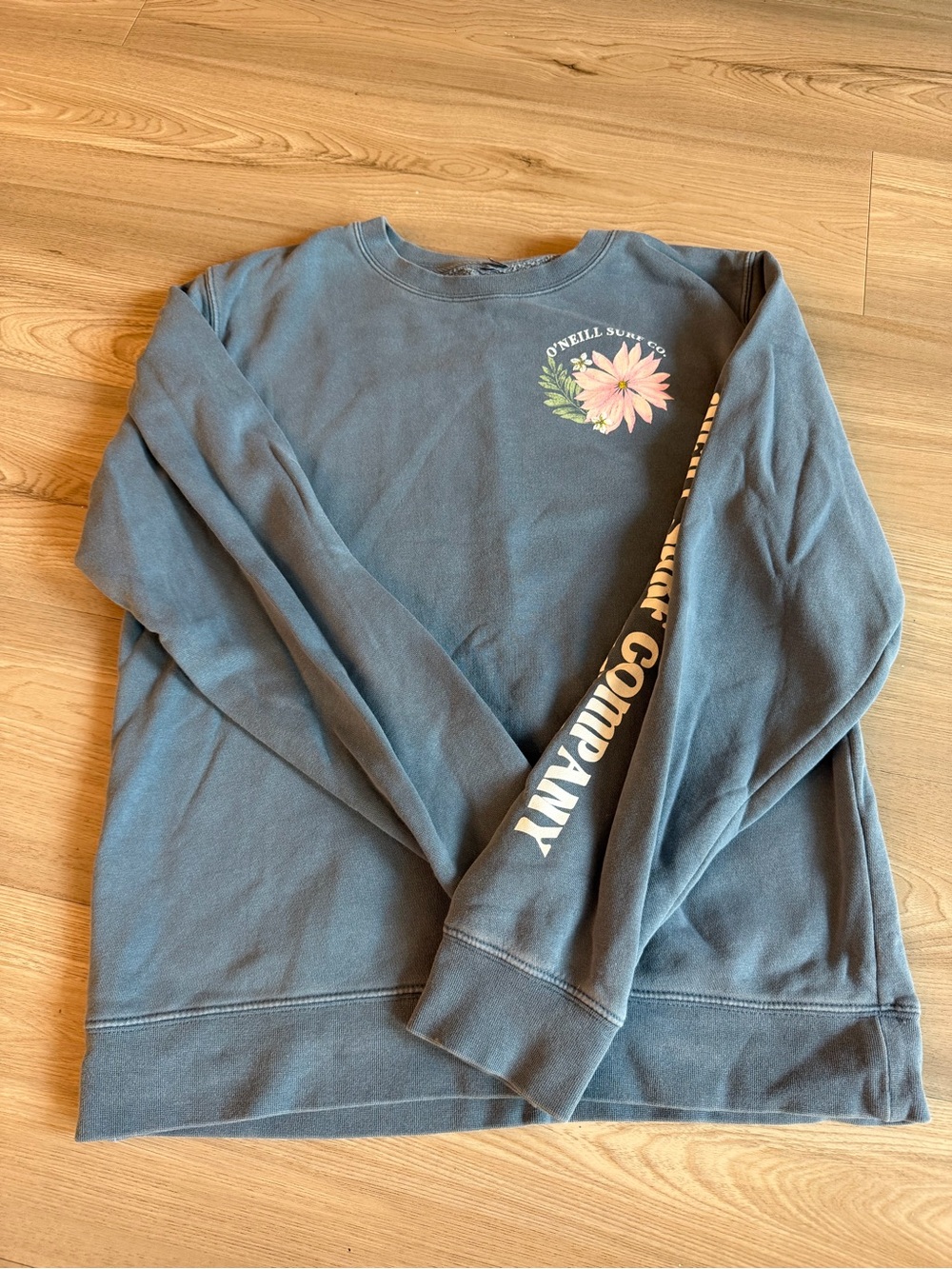 O'Neill Surf Co. Blue Crewneck Sweatshirt with Pink Floral Graphic